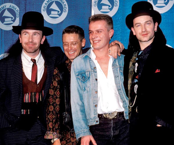 Left to right: U2's The Edge, Adam Clayton, Larry Mullen Jr. and Bono attend the 1988 Grammy Awards.
