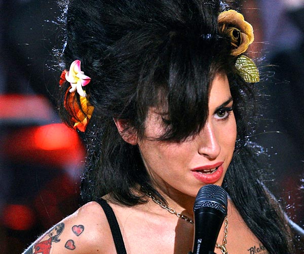 After her live performance from London, Amy Winehouse celebrates her win at the 50th Grammy Awards.