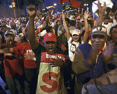 Supporters cheer the amendment's passage. "Chavez is the first president who cared about the poor, who truly loves his country and its people," says one voter.