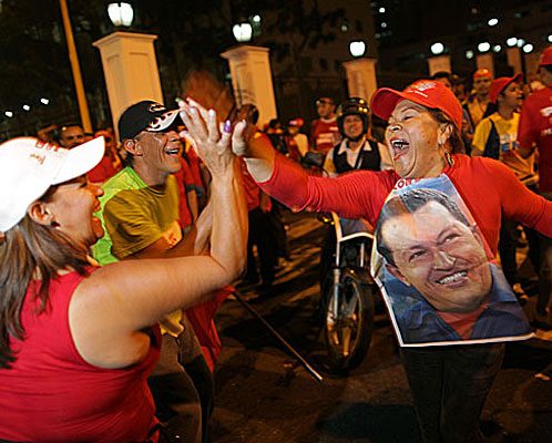 Supporters of President Hugo Chavez celebrate in Caracas after polls close. Poor and working-class voters were solidly behind him.