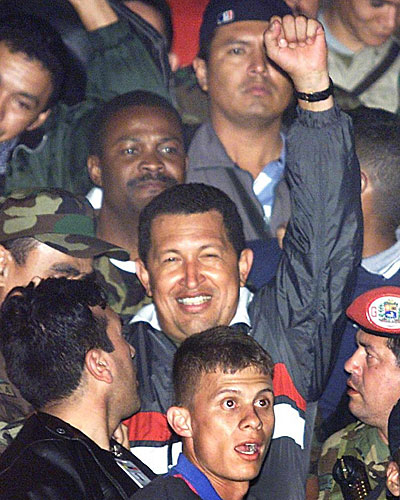 Venezuelan President Hugo Chavez is greeted by supporters upon his return to the presidential palace  in Caracas. 