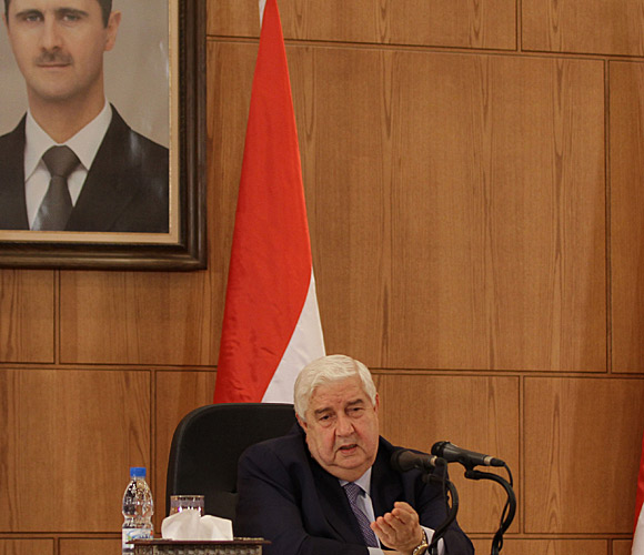 Foreign Minister Walid Moallem pledges Syria's full cooperation with Arab observers. 