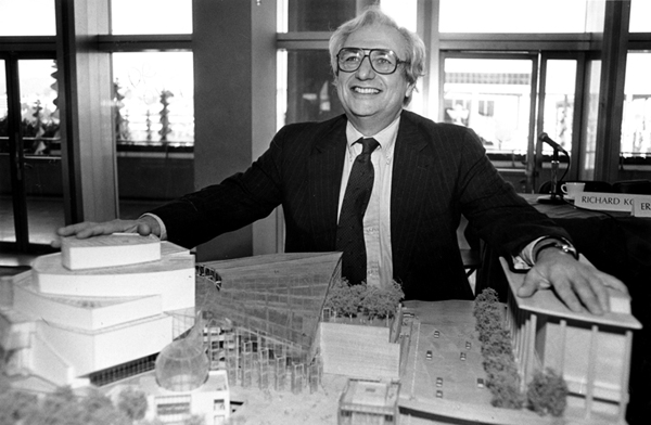 Frank Gehry with a model of the proposed Walt Disney Concert Hall on the day he was selected as architect. 