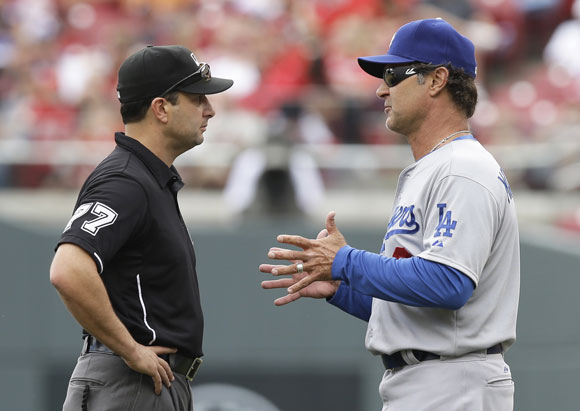 Don Mattingly has a few words with umpire Jim Reynolds.