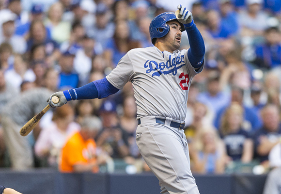 Dodgers first baseman Adrian Gonzalez hits a home run in the Dodgers' 4-1 loss to the Brewers.