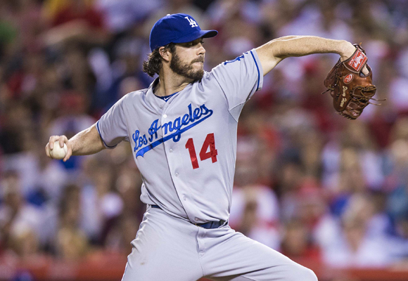 Dodgers starer Dan Haren delivers a pitch during the team's 2-1 win over the Angels.