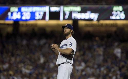 Clayton Kershaw reacts after giving up his first run in 41 innings.