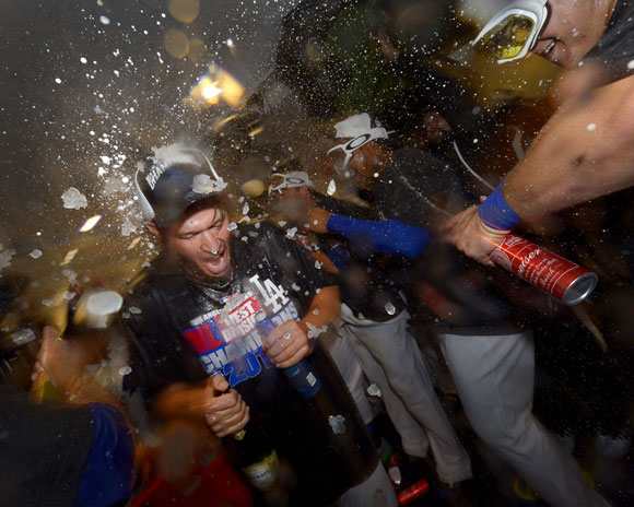 Clayton Kershaw celebrates after the Dodgers win the West.