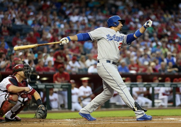 Adrian Gonzalez hits a two-run home run in the first inning.