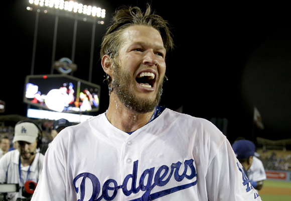 Dodgers ace Clayton Kershaw celebrates after throwing his first no-hitter in an 8-0 victory over the Colorado Rockies.