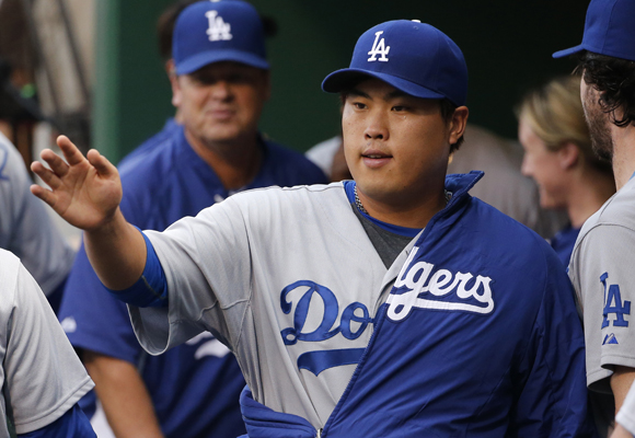 Dodgers starter Hyun-Jin Ryu walks in the dugout before the team's 5-2 win over the Pittsburgh Pirates.