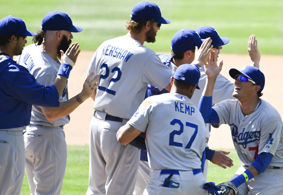 The Dodgers celebrate their 2-1 victory over the San Diego Padres.