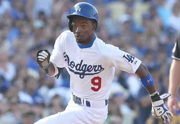 Dodgers baserunner Dee Gordon rounds third base to score from second on a wild pitch during the second inning of the team's 9-1 win over the St. Louis Cardinals.