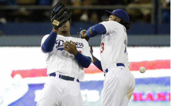 Carl Crawford, left, and Hanley Ramirez misplay a ball in the 10th inning.
