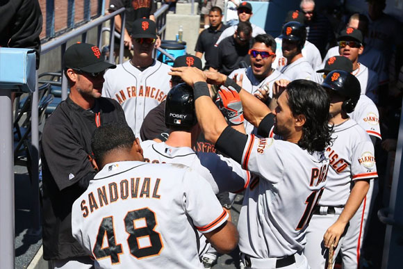 The Giants swamped the Dodgers on in L.A.'s home opener.