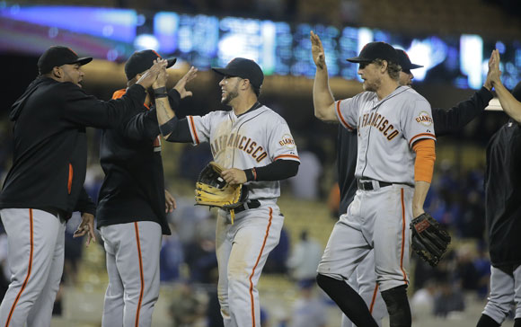 The Giants celebrate their victory over the Dodgers.