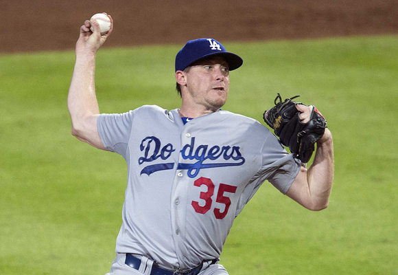 Dodgers starter Kevin Correia delivers a pitch during the sixth inning of the team's 6-2 win over the Atlanta Braves.