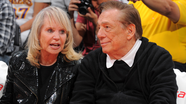 Shelly Sterling, left, and husband Donald Sterling attend an L.A. Clippers game against the Indiana Pacers at Staples Center in April 2013.