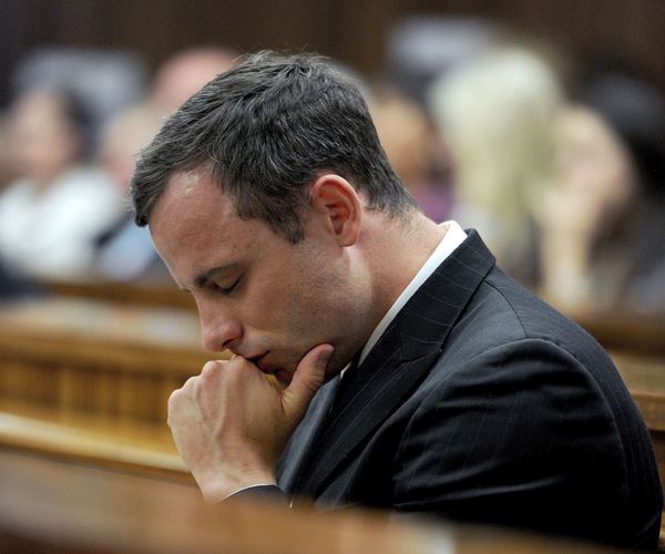 Pistorius listens to court proceedings.