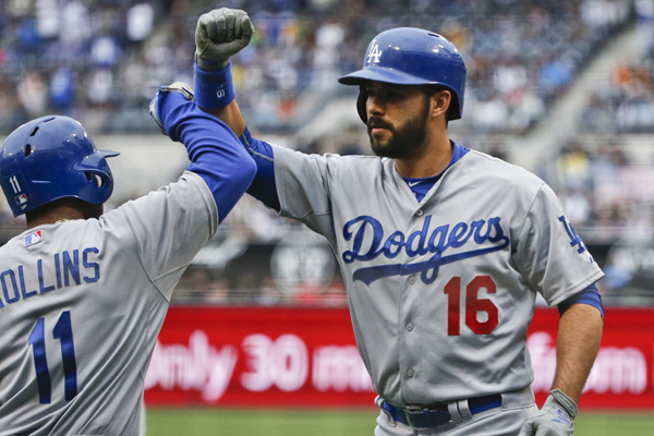 Dodgers right fielder Andre Ethier, right, is congratulated by teammate Jimmy Rollins after hitting a two-run home run during the first inning of an 11-8 win over the San Diego Padres.