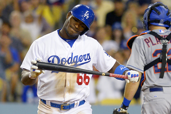 Dodgers right fielder Yasiel Puig reacts after striking out during the sixth inning of a 2-1 loss to the New York Mets.