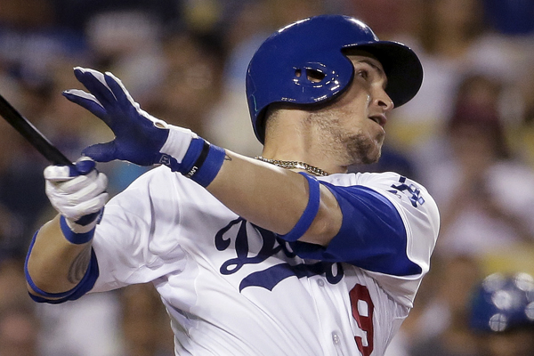 Dodgers catcher Yasmani Grandal hits a two-run home run during the sixth inning of a 7-2 loss to the Philadelphia Phillies.
