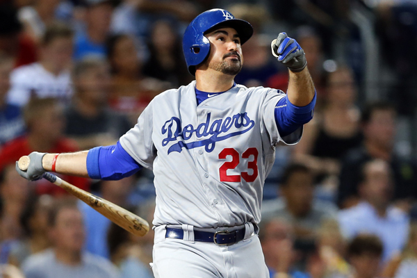 Dodgers first baseman Adrian Gonzalez follows through on a two-run home run during the fifth inning of a 7-5 loss to the Atlanta Braves.