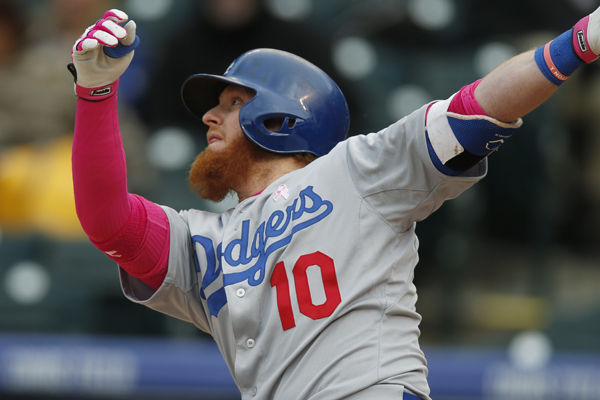 Dodgers pinch hitter Justin Turner hits a two-run home run in the eighth inning of a 9-5 win over the Colorado Rockies.