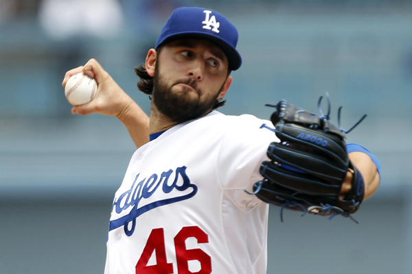 Dodgers starter Mike Bolsinger delivers a pitch during the first inning of a win over the Colorado Rockies.