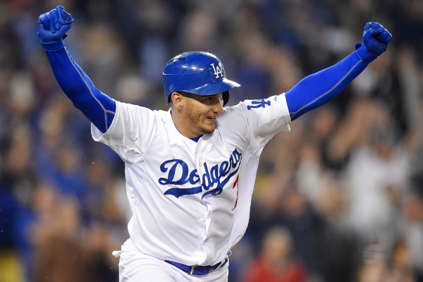 Dodgers third baseman Alex Guerrero celebrates his walk-off single in the 10th inning against the Seattle Mariners.