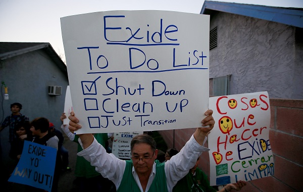 Community members celebrate the closure of the Exide Technologies battery recycling plant.