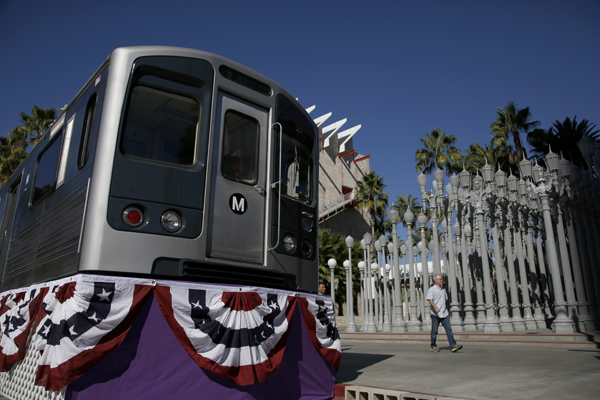 A replica rail car sits in front of the LACMA during a groundbreaking ceremony for the city's subway extension to the west.