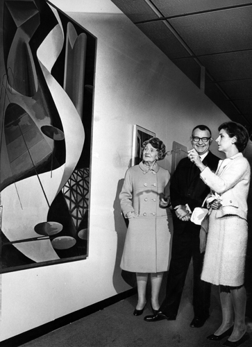 Newly named LACMA Director Kenneth Donahue, center, Mrs. Francis Salabert and Mrs. Andre Malraux admire paintings by Man Ray on Nov. 4, 1966.