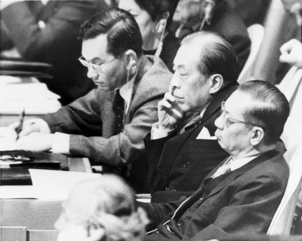 Taiwan's Foreign Minister Chow Shu-kai, foreground, and Ambassador Lui Chieh, center, watch closely as the United Nations General Assembly votes on preliminary questions to a proposal to admit mainland China. (Associated Press)