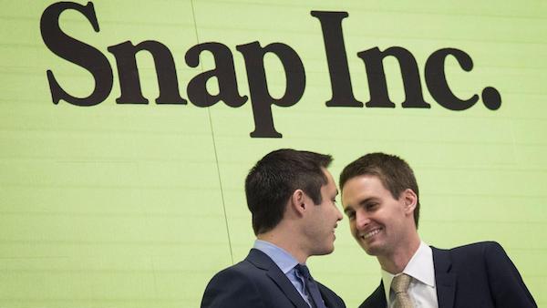 Snapchat co-founders Bobby Murphy and Evan Spiegel after ringing the opening bell at the New York Stock Exchange. 
