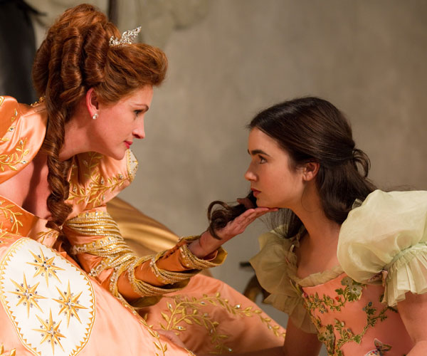Julia Roberts, left, as the queen and Lily Collins as Snow White.