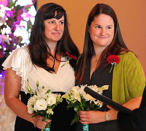 Julia Fraser, left, and Jessica Rohrbacher get married.