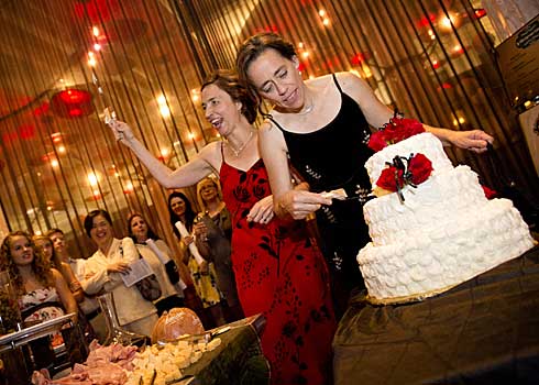 The first couple married in Minneapolis Cathy ten Broeke, left, and Margaret Miles cut their wedding cake at The Hotel Minneapolis Thursday Aug. 1, 2013. 