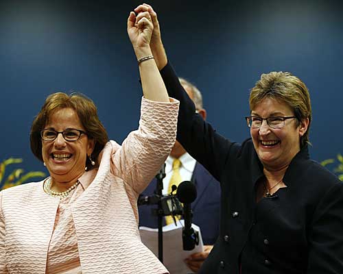 Beth Asaro, left, and Joanne Schailey celebrate after exchanging vows to become the first same-sex couple married in Lambertville, N.J.