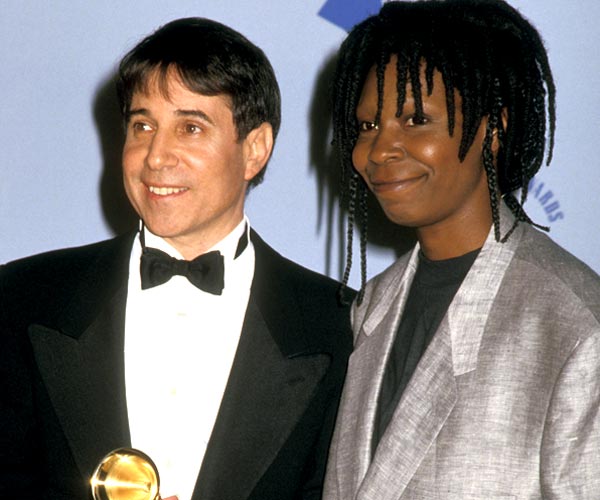 Musician Paul Simon and actress Whoopi Goldberg attend the Grammy Awards at the Shrine Auditorium in Los Angeles.