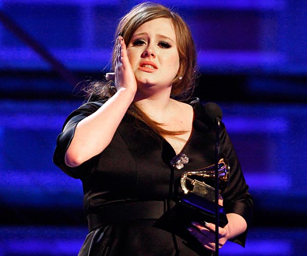 Adele receives the award for best new artist at the 51st Grammy Awards.