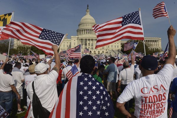 People gather outside the Capitol in Washington to show their support for comprehensive immigration reform.